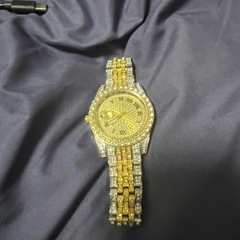 アメリカの市場で買ったよく分からない時計とサングラス2個の画像