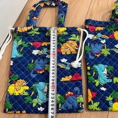 恐竜柄 レッスンバッグ＆巾着袋セット（未使用美品）の画像