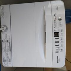 冷蔵庫、洗濯機、ダイニングセットの画像