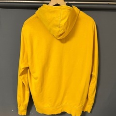 THE NORTH FACEイエロー　
フード付きパーカー。の画像