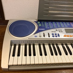 CASIO キーボード LK-57 光ナビゲーション 61鍵盤 ACアダプター・譜面立て付 動作確認済み 美品 電子ピアノの画像