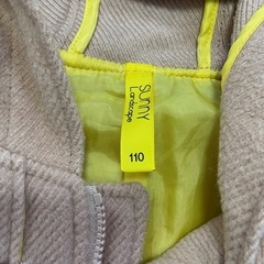 110cm茶色のコートの画像