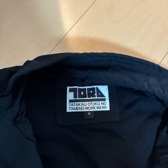 作業着　トライチの画像