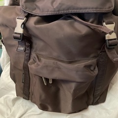 コムサイズムのリュック　茶色の画像