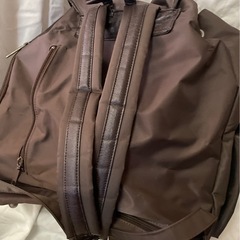 コムサイズムのリュック　茶色の画像