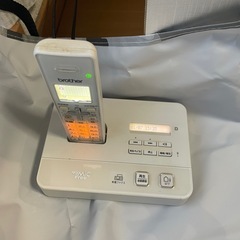 ［印刷不可］ブラザーのプリンター（複合機）と子機、未使用の互換インクと説明書のセットの画像