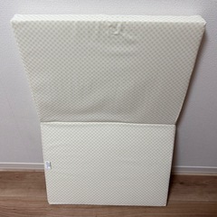 ベビーベッド用マットレス（カバー付き）の画像