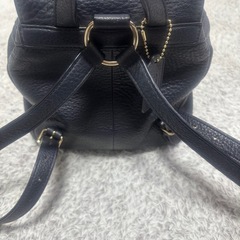 COACHミニリュックの画像