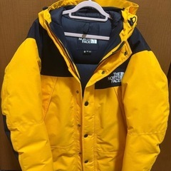 THE NORTH FACE マウンテンダウンジャケット サミットイエローの画像