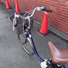 パナソニックのネイビー電動アシスト自転車 の画像
