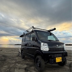 軽キャンピングカー(タープ付き)の画像