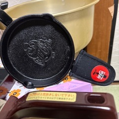 両手鍋とフライパンの画像