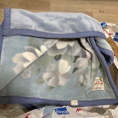 羊毛敷布団。西川毛布。の画像
