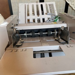 自動紙折り機　の画像