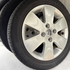 日産モコ純正ホイールタイヤセットの画像
