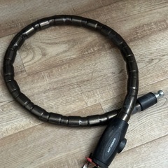 バイクカバー、ヘルメット、チェーンの画像