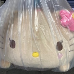 日焼けキティ　コロふわ　ねそべりクッション　色ブラウンの画像