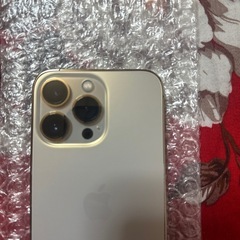 iPhone 13 Pro 128GB、バッテリー残量100%、ゴールドカラーの画像