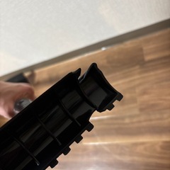 車上の雪をかくブラシの画像