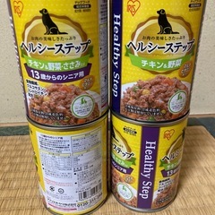 ドライドッグフードと缶詰め5缶の画像