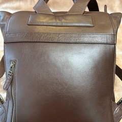 マザーハウスMOTHERHOUSEリュックサック ナップザック リックサック ルックザック サブリュック ナップサック バックパック デイパックダークブラウン焦げ茶色無地レザー、牛革、本革チャームmenwomenメンズレディースユニセックス男性用女性用紳士婦人の画像