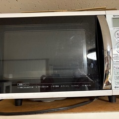 冷蔵庫、洗濯機、電子レンジのセットの画像