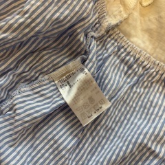 【BEBE SLAP SLIP BABY】リボン付きストライプレースフリルロンパースの画像