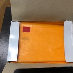 使い捨てのビニールエプロン50枚入りの画像