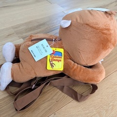 おさるのジョージ　寝そべりリュックの画像