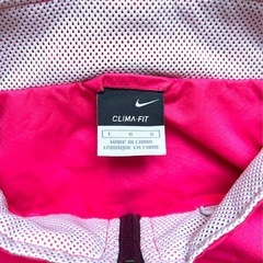 NIKE ナイキ CLIMA-FITナイロンジャケット ショッキングピンク ダークパープルの画像