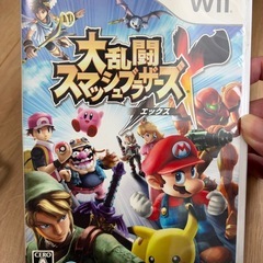 Wii本体、リモコン2つ、スマブラの画像