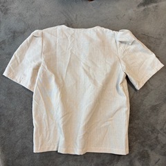 ENLIKE トップス オフホワイトの画像