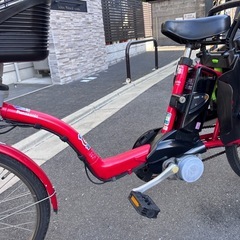 Panasonic 電動アシスト自転車 赤 チャイルドシート付きの画像