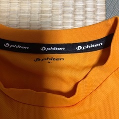 phiten メッシュ上下セット　サイズMの画像