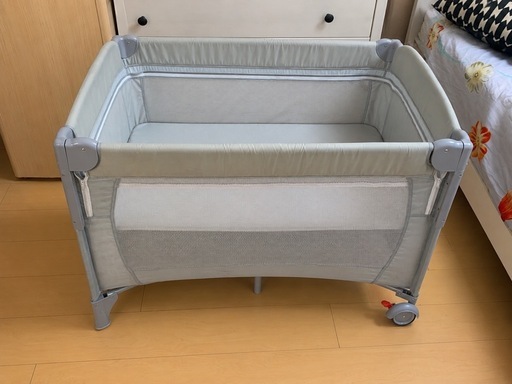 baby cot and baby bed and a baby diaper changing bed 